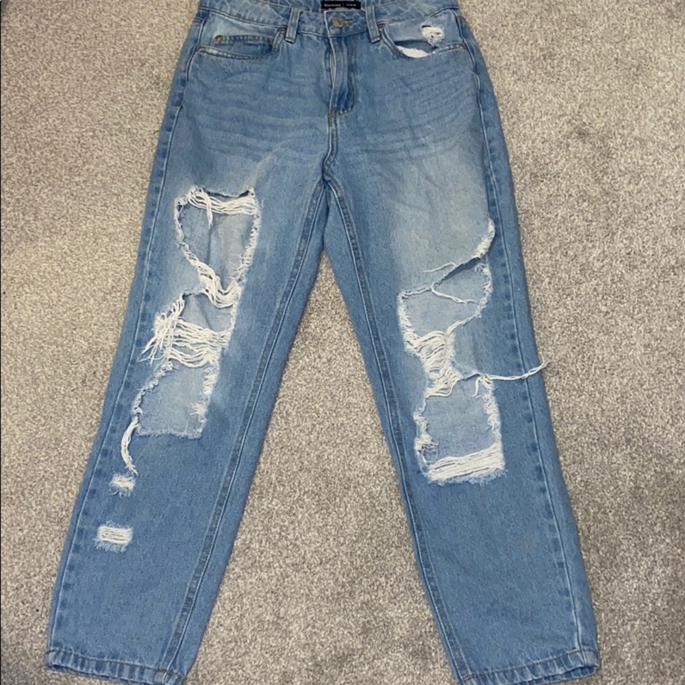 Blue ripped mom jeans